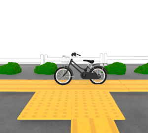 視覚障害者誘導用ブロックの上にある自転車のイラスト