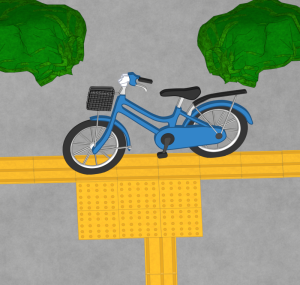 視覚障害者誘導用ブロックの上にある自転車のイラスト