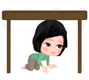 地震で机の下に隠れる女性のイラスト